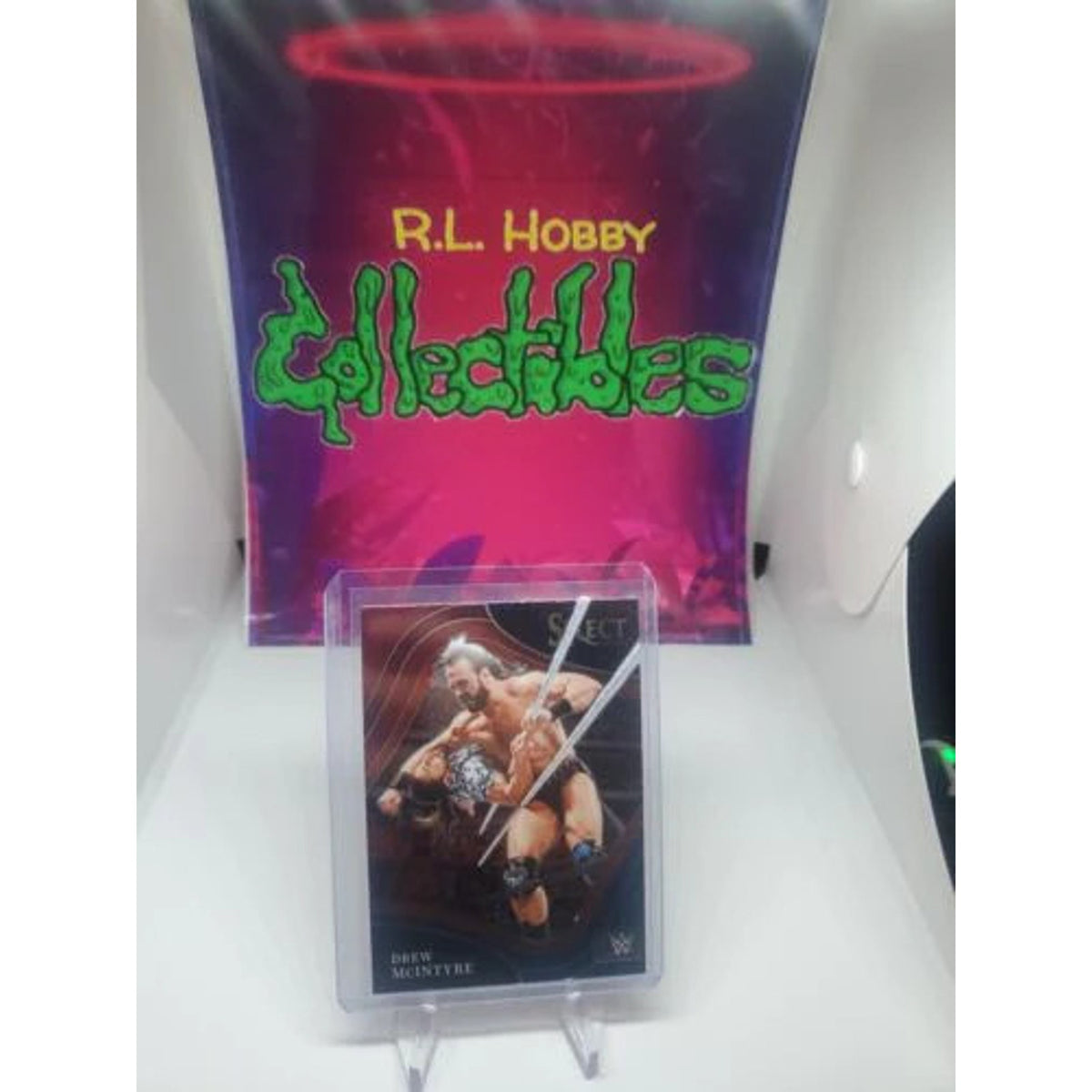DREW MCINTYRE: 2022 Panini Select WWE🔥RED BLUE RINGSIDE🚨SP #276 SmackDown