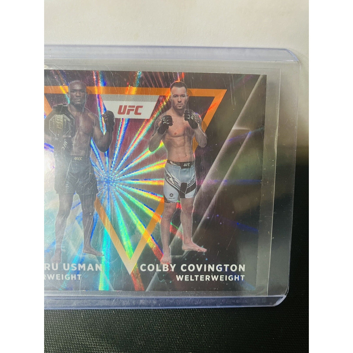 2022 Panini Donruss UFC Duos #4 Kamaru Usman Colby Covington Orange Laser Holo