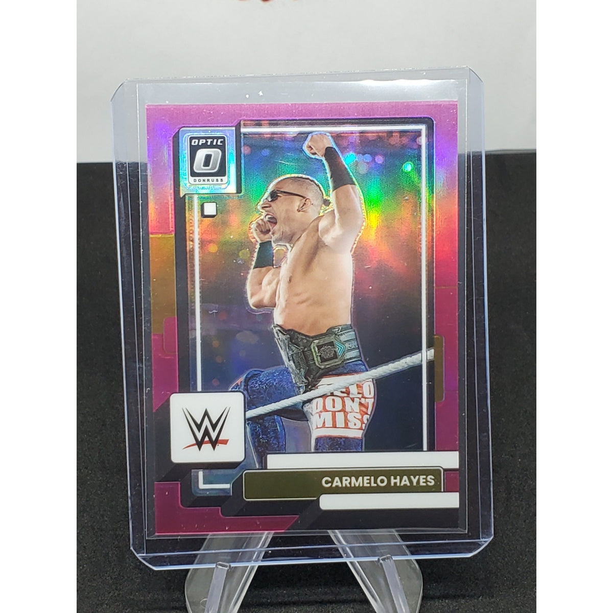 Carmelo Hayes 2023 Panini Chronicles WWE Optic Pink Prizm /199 #374