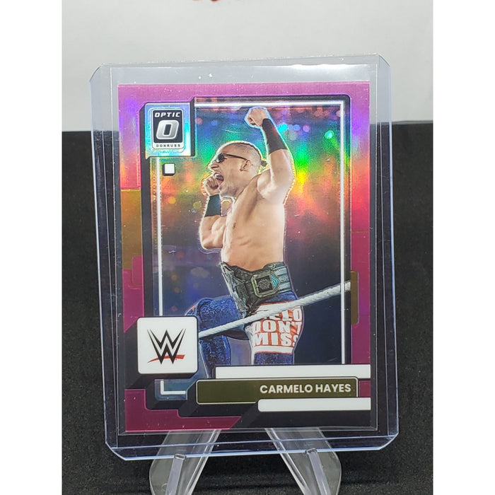 Carmelo Hayes 2023 Panini Chronicles WWE Optic Pink Prizm /199 #374